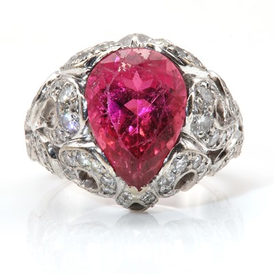 Lot 390 - A white gold hot pink tourmaline and diamond ring, by Adler