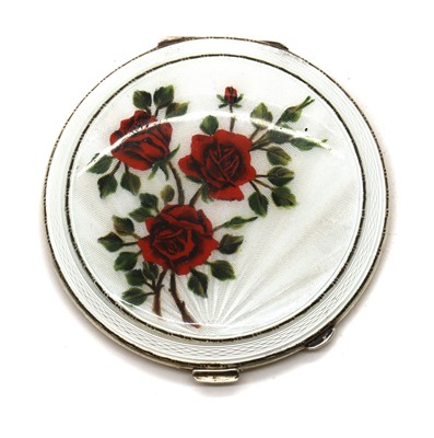 Lot 64 - An enamelled silver compact