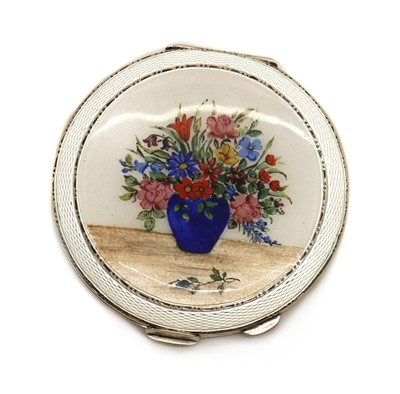 Lot 71 - An enamelled silver compact