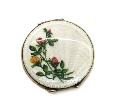 Lot 72 - An enamelled silver compact