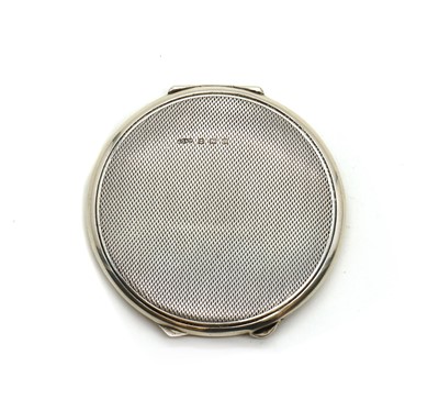 Lot 72 - An enamelled silver compact