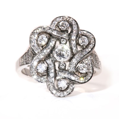 Lot 399 - An 18ct white gold diamond set formal knot style plaque ring