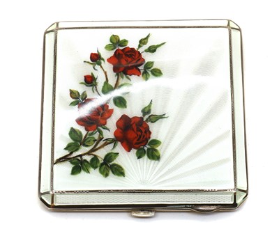 Lot 42 - An enamelled silver compact