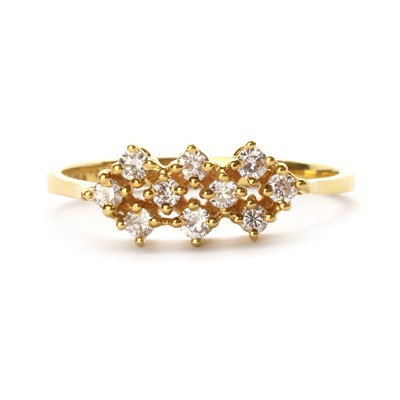 Lot 1127 - An 18ct gold diamond cluster ring