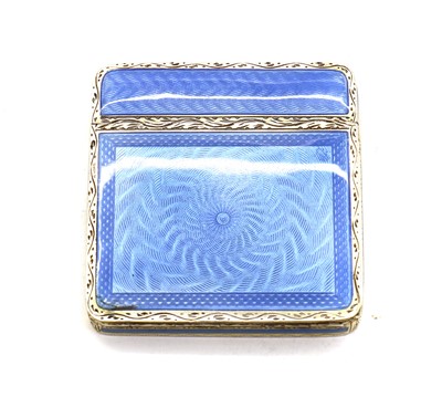 Lot 74 - An enamelled silver compact