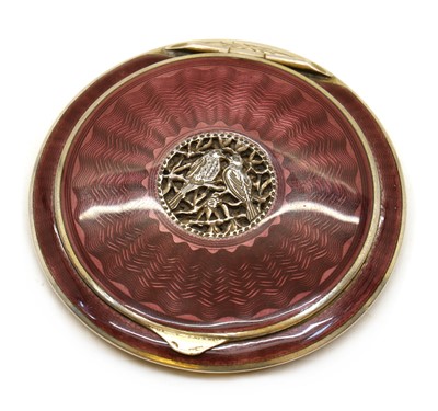 Lot 88 - An enamelled silver compact