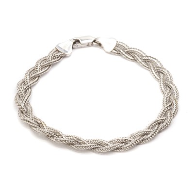 Lot 1228 - A white gold plaited bracelet