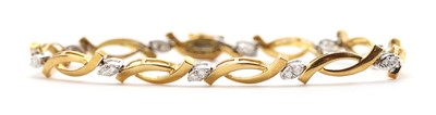 Lot 1126 - An 18ct gold diamond set bracelet