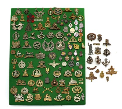 Lot 234 - A large collection of military cap badges