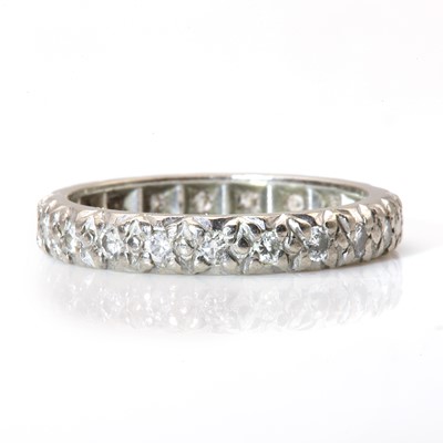 Lot 109 - A white gold diamond full eternity ring