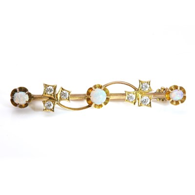 Lot 16 - An Art Nouveau gold opal and diamond bar brooch