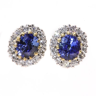 Lot 279 - A pair of 18ct gold sapphire and diamond oval cluster earrings