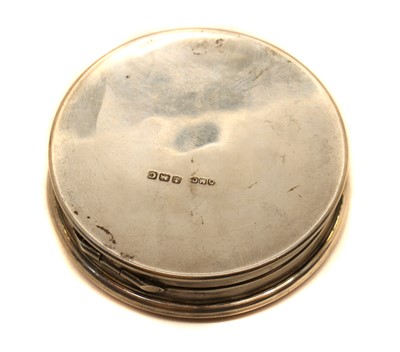 Lot 94 - An enamelled silver compact