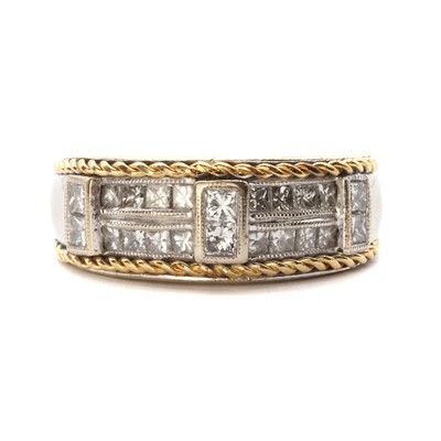 Lot 1138 - A two colour gold diamond ring