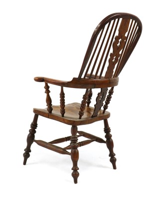 Lot 410 - A elm and beech windsor chair