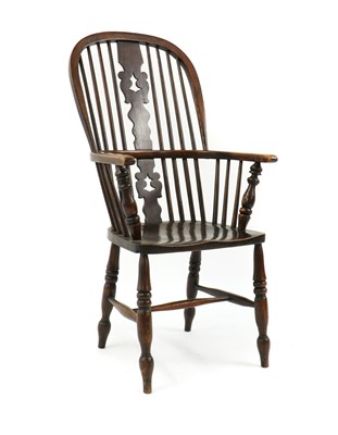 Lot 399 - A elm and beech windsor chair