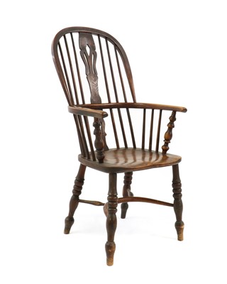 Lot 405 - A elm and beech windsor chair