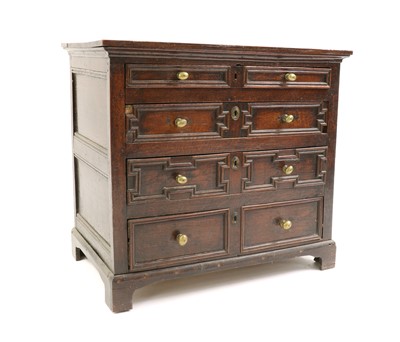 Lot 408 - A Charles II and later oak chest of drawers