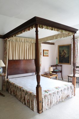 Lot 384 - A George III style mahogany four-poster bed