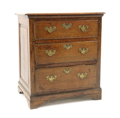 Lot 409 - A country made oak chest of drawers