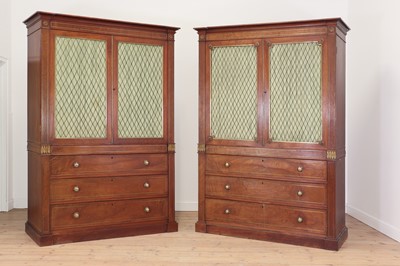 Lot 103 - A pair of George IV mahogany press cupboards