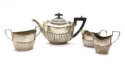 Lot 65 - An associated four-piece silver tea service