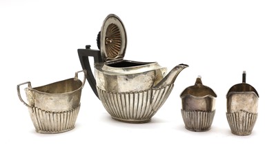 Lot 65 - An associated four-piece silver tea service