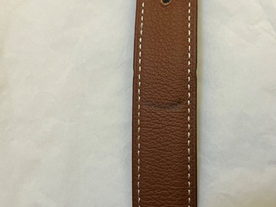 Lot 1497 - An Hermès black/ tan reversible belt