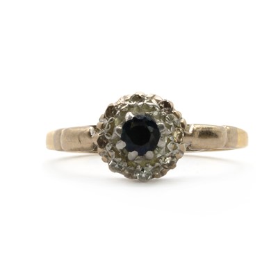 Lot 156 - A gold sapphire and diamond cluster ring