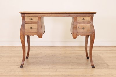 Lot 231 - A stripped walnut writing table