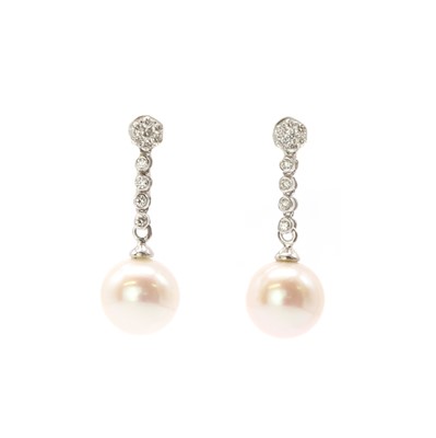 Lot 181 - A pair of white gold cultured freshwater pearl and diamond drop earrings