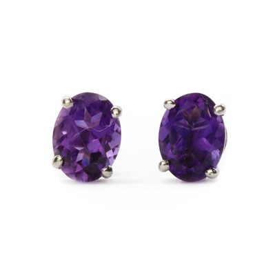 Lot 163 - A pair of silver single stone amethyst stud earrings