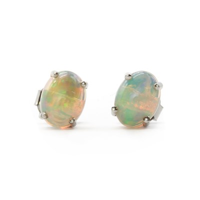 Lot 186 - A pair of silver single stone opal stud earrings