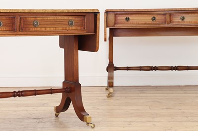 Lot 80 - A pair of Regency-style rosewood and satinwood crossbanded sofa tables