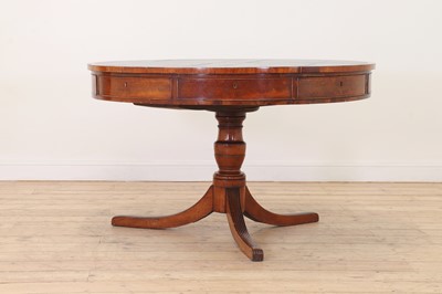 Lot 47 - A late George III mahogany library drum table