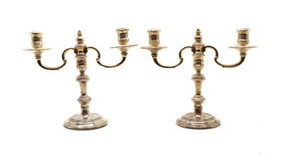 Lot 6 - A pair of silver candelabra