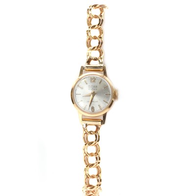 Lot 1417 - A ladies' gold Titan mechanical bracelet watch