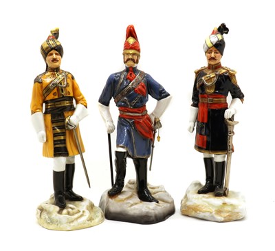 Lot 101 - A group of three Michael Sutty porcelain figures