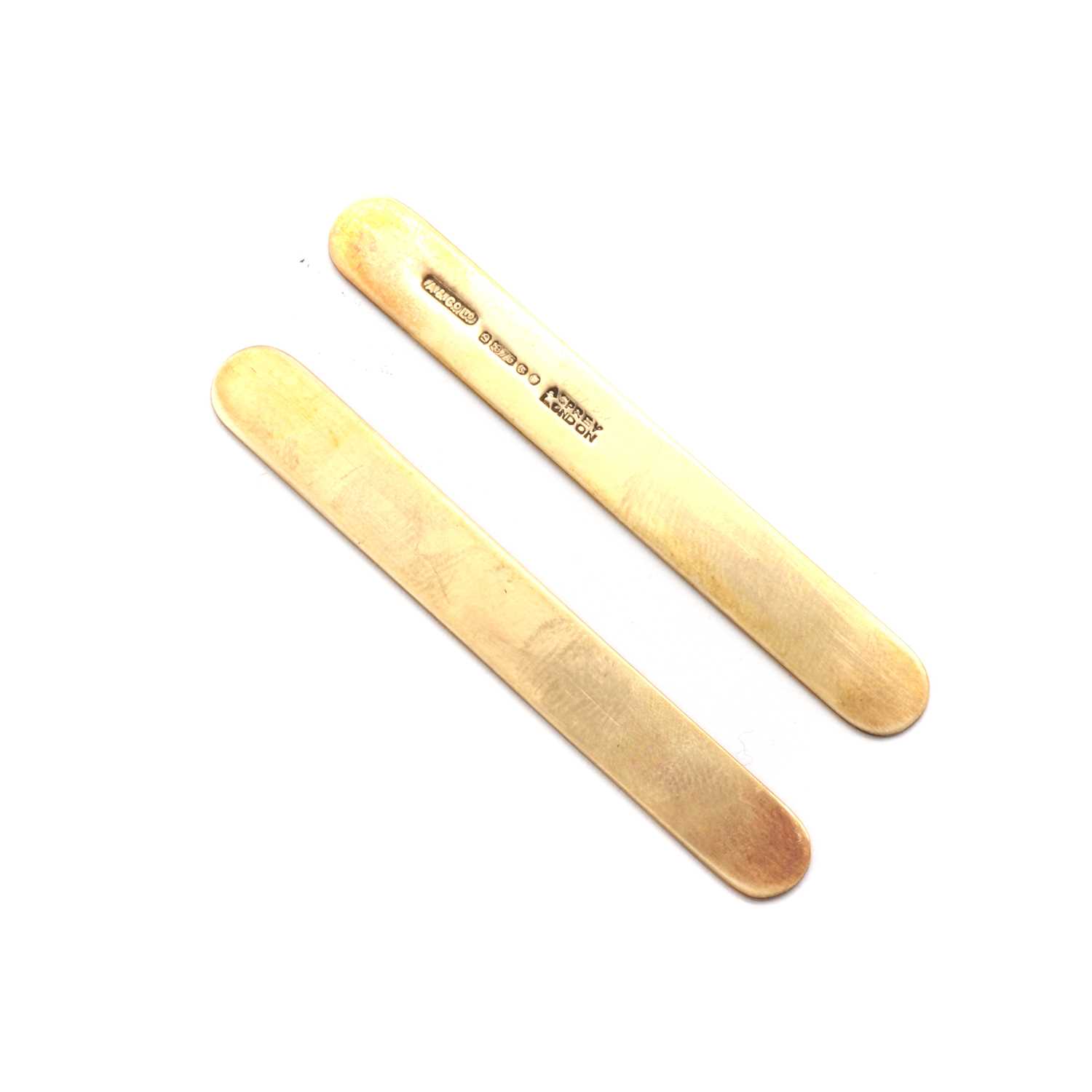 Lot 1390 A pair of 9ct gold collar stiffeners, by