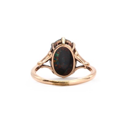 Lot 143 - A single stone black opal ring