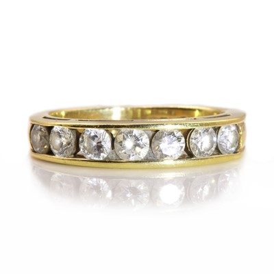 Lot 54 - An 18ct gold seven stone diamond half eternity ring