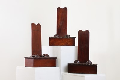 Lot 87 - A group of three mahogany plate stands