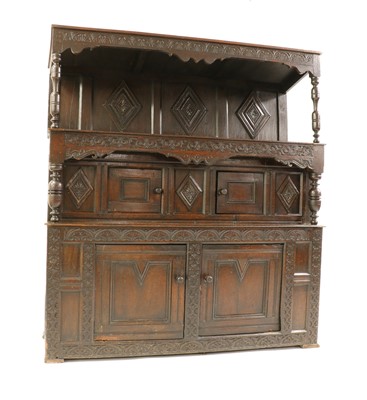 Lot 614 - An oak press cupboard