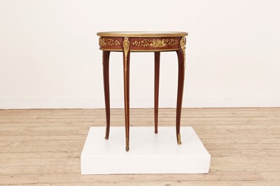 Lot 149 - A Louis XVI-style mahogany occasional table by François Linke (French, 1855-1946)