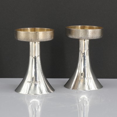 Lot 443 - A pair of silver candlesticks