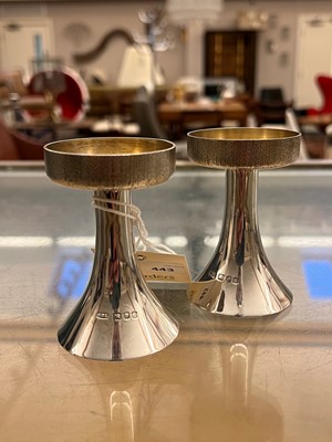 Lot 443 - A pair of silver candlesticks