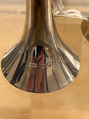 Lot 443 - A pair of silver candlesticks