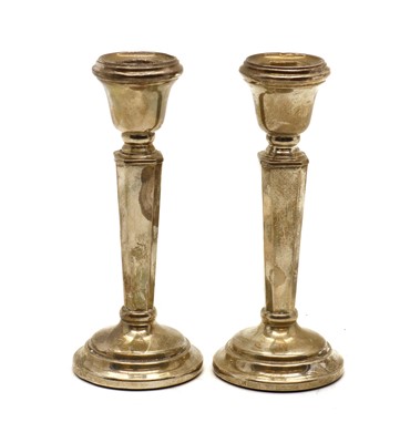 Lot 9 - A pair of silver candlesticks