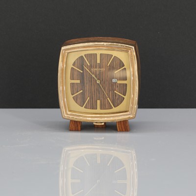 Lot 518 - A Longines gilt and rosewood bedside clock