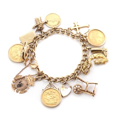 Lot 1506 - A gold charm bracelet